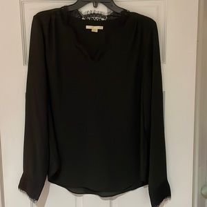 Cooper & Ella black blouse with lace details in size medium